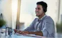 A 24/7 IT support and IT services Technician at a computer